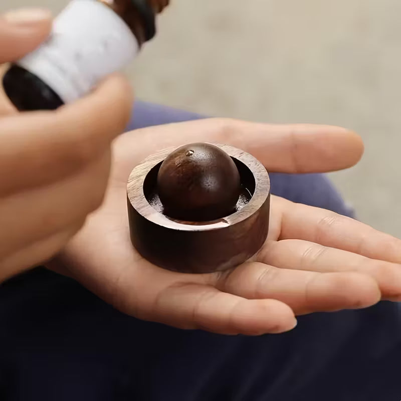 Elegante difusor de aroma de madera con diseño giratorio: sin pilas ni cable.